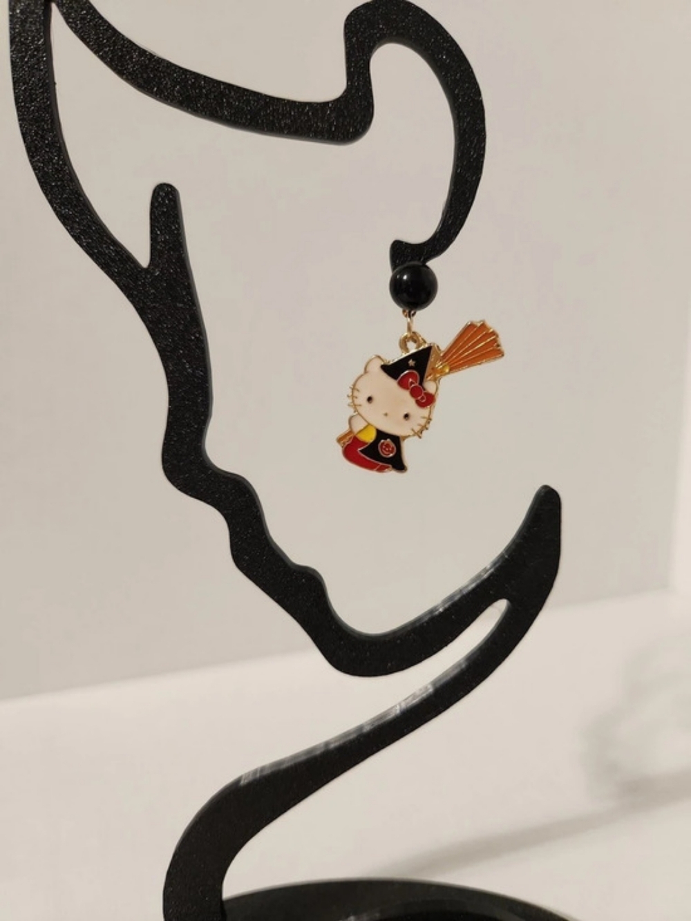 Hello Kitty Dressed As A Witch Drop Earrings in Black & Gold